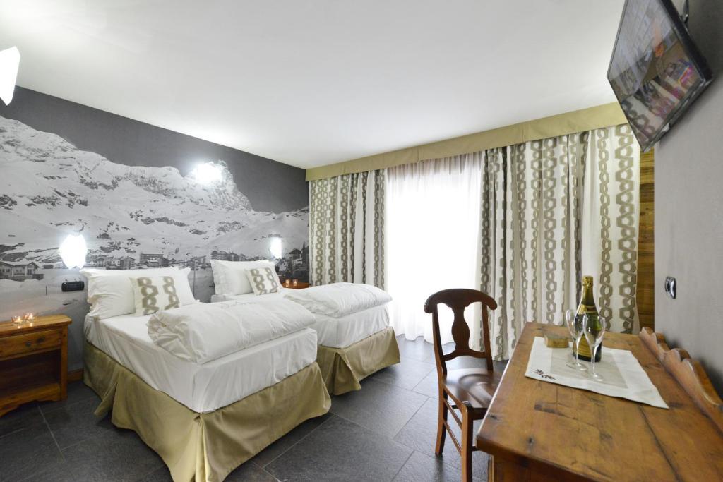 Mollino Rooms Брей-Червиния Номер фото